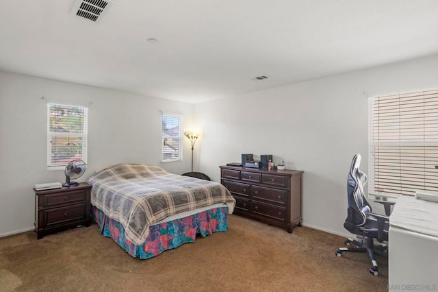 bedroom featuring carpet