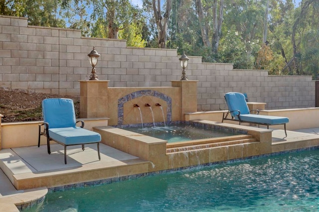 view of pool featuring pool water feature