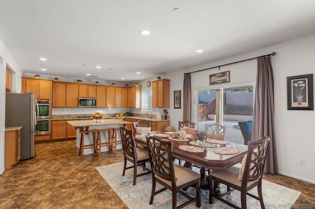 dining space with sink