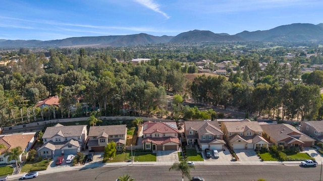 birds eye view of property featuring a mountain view