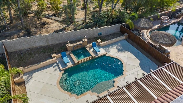 view of swimming pool featuring a patio