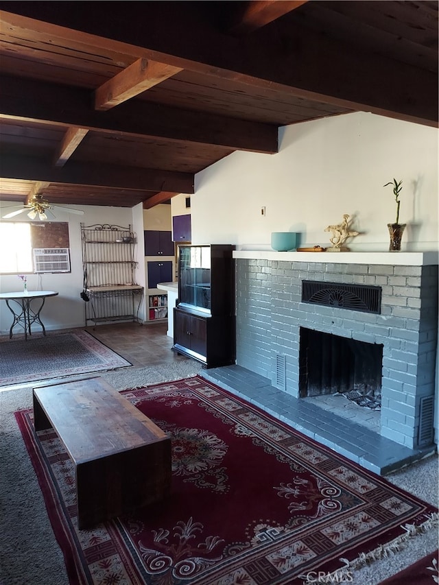 living room with ceiling fan, cooling unit, a brick fireplace, lofted ceiling with beams, and wooden ceiling