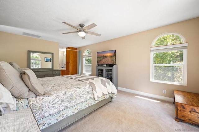 carpeted bedroom featuring ceiling fan