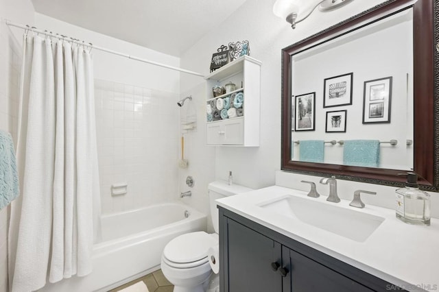 full bathroom featuring tile patterned flooring, vanity, toilet, and shower / bathtub combination with curtain