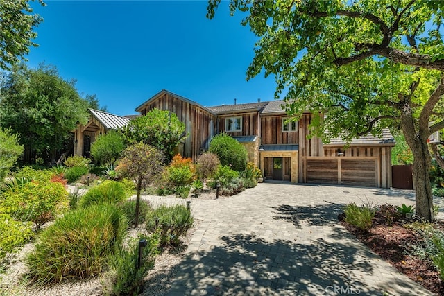 view of front of home with a garage