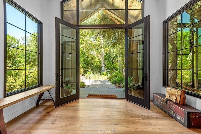 doorway to outside with light hardwood / wood-style flooring