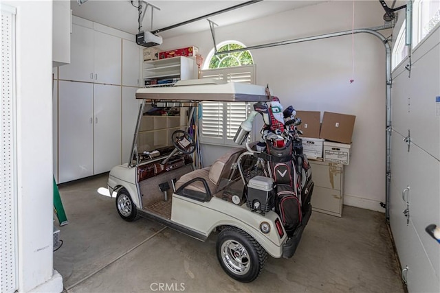 garage featuring a garage door opener