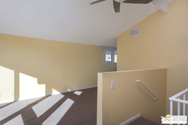 staircase featuring carpet, high vaulted ceiling, and ceiling fan