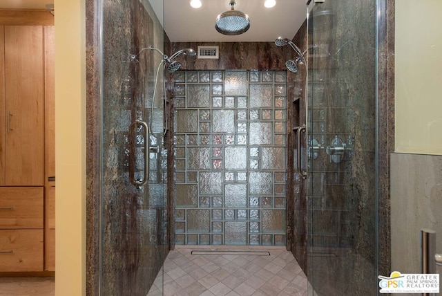 bathroom with tiled shower