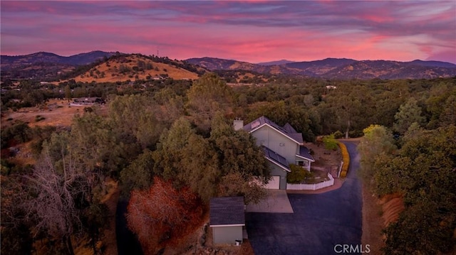 aerial view at dusk with a mountain view