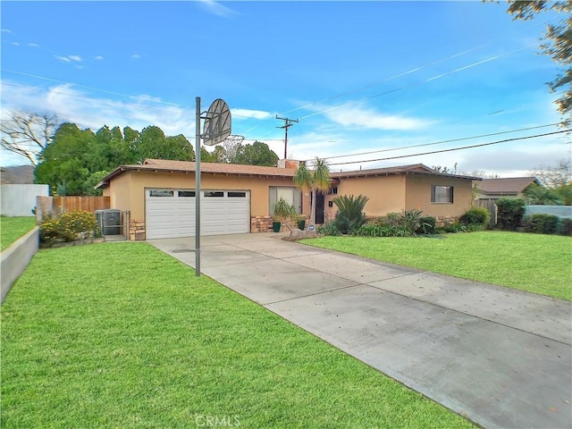 single story home with a garage and a front yard