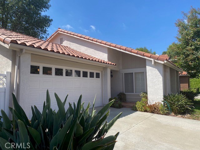 mediterranean / spanish house featuring a garage