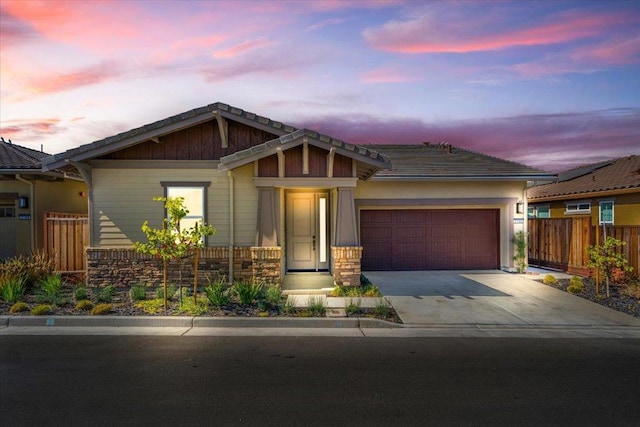 craftsman-style house featuring a garage