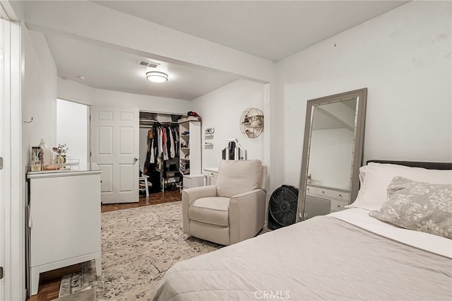 bedroom featuring a closet and hardwood / wood-style floors