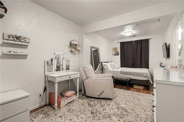 bedroom featuring light wood-type flooring