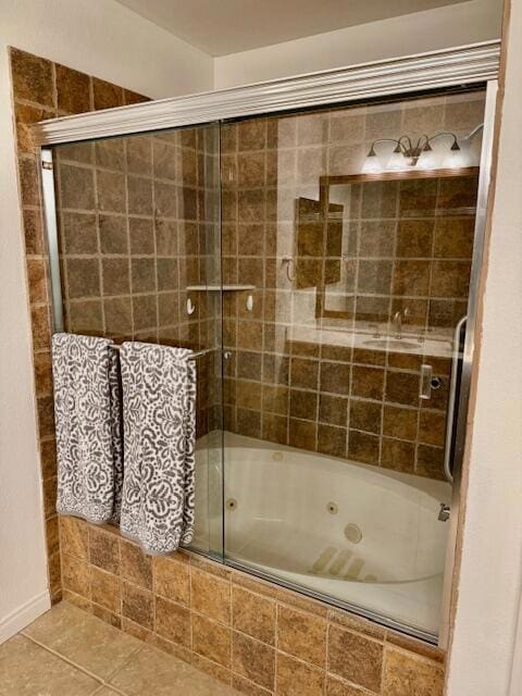 bathroom with enclosed tub / shower combo and tile patterned flooring