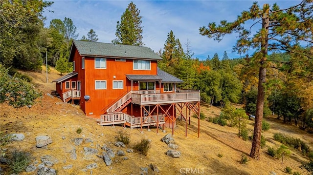 rear view of house with a deck