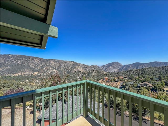 balcony featuring a mountain view