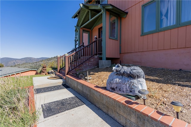 view of home's exterior with a mountain view