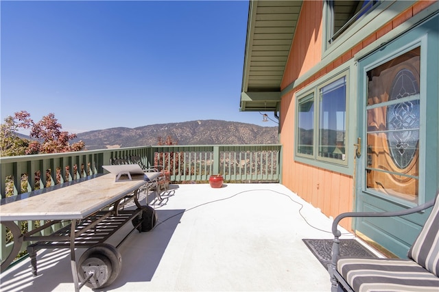 view of patio featuring a mountain view