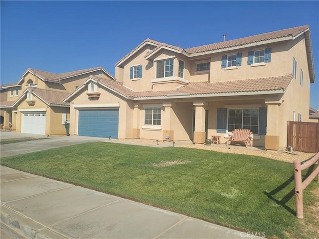 mediterranean / spanish-style house with a front yard