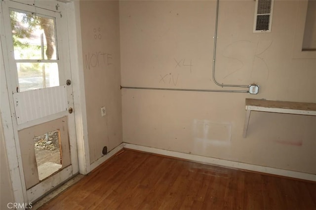 washroom with hardwood / wood-style floors