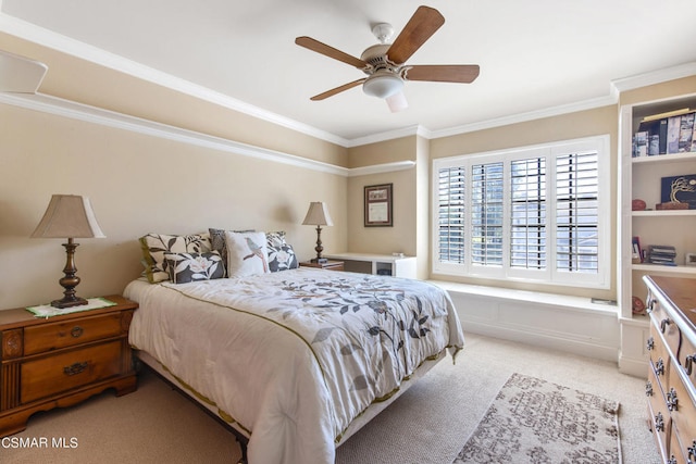 bedroom featuring ceiling fan, light colored carpet, and ornamental molding