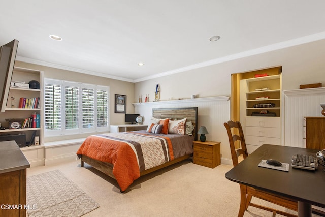 carpeted bedroom with ornamental molding