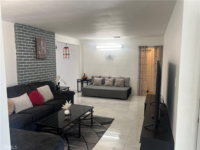 living room featuring light tile patterned floors