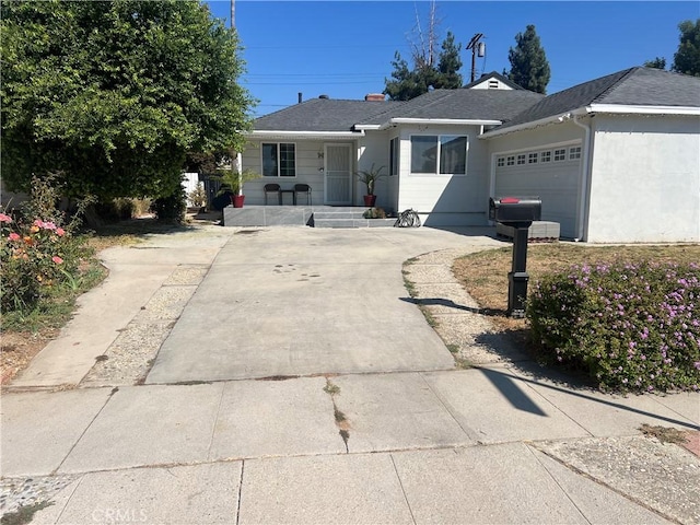 single story home featuring a garage