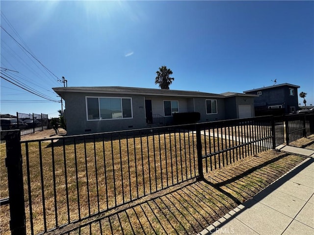 ranch-style home with a front yard