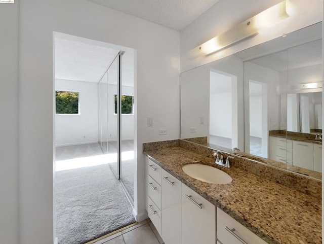 bathroom featuring vanity and tile patterned floors