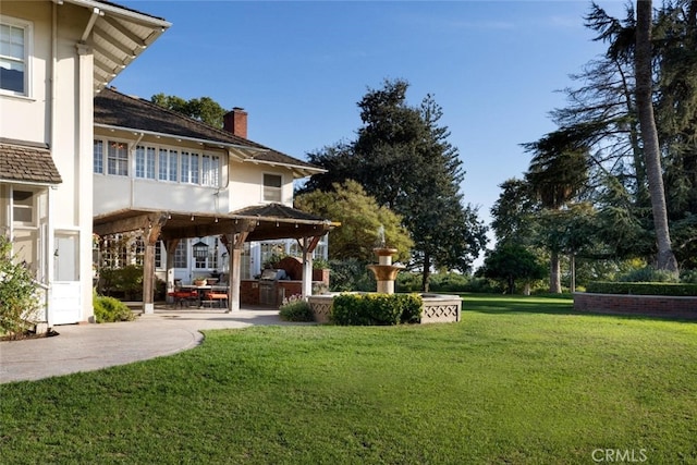 view of yard featuring a patio