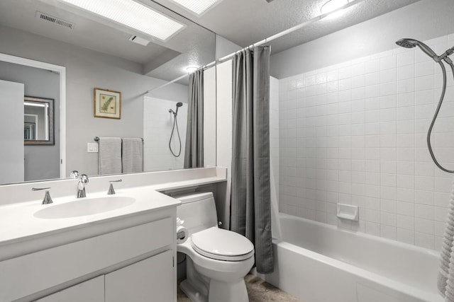 full bathroom featuring shower / bath combination with curtain, vanity, and toilet