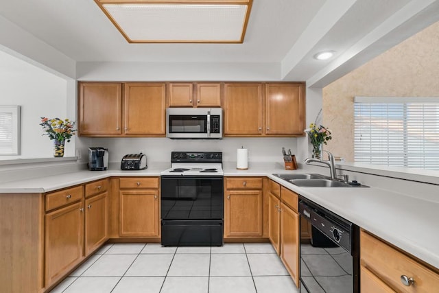 kitchen featuring range with electric cooktop, dishwasher, light tile patterned floors, and sink