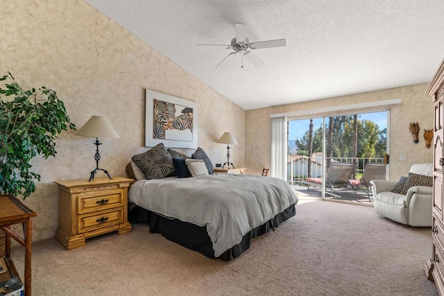 bedroom featuring a textured ceiling, vaulted ceiling, access to exterior, ceiling fan, and carpet floors