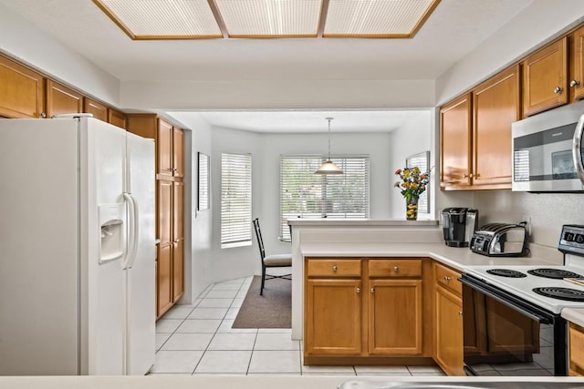 kitchen with electric range oven, decorative light fixtures, light tile patterned floors, kitchen peninsula, and white fridge with ice dispenser