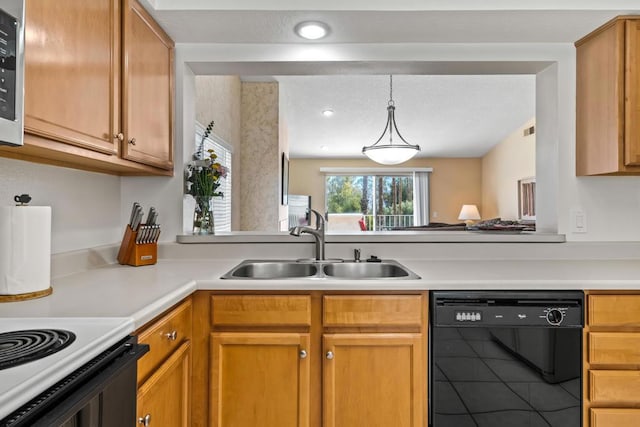 kitchen with sink, range with electric stovetop, pendant lighting, and black dishwasher