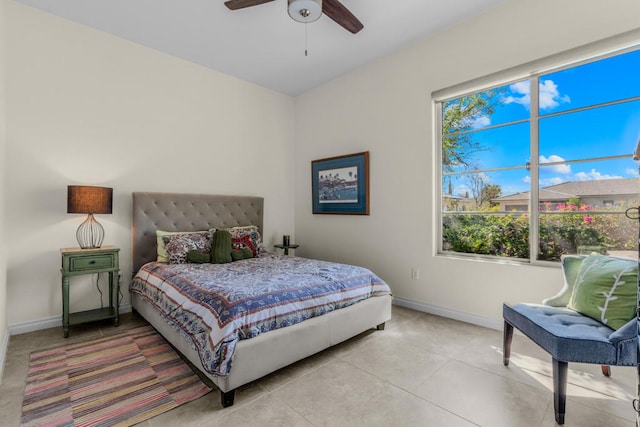 bedroom featuring ceiling fan and light tile patterned floors