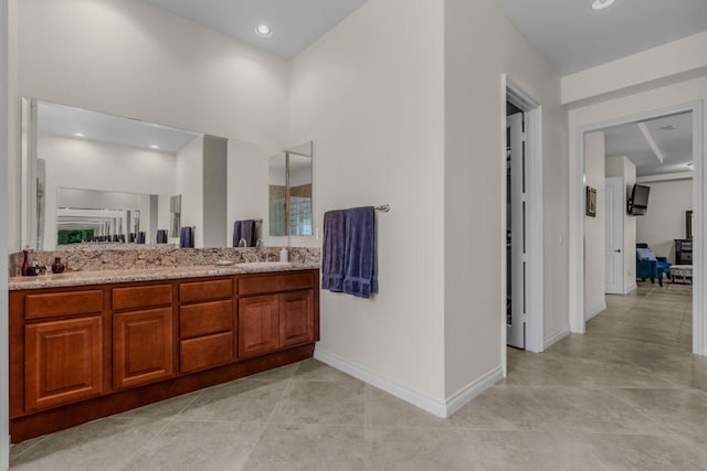 bathroom with vanity and tile patterned flooring