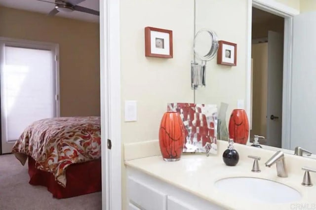 bathroom featuring ceiling fan and vanity