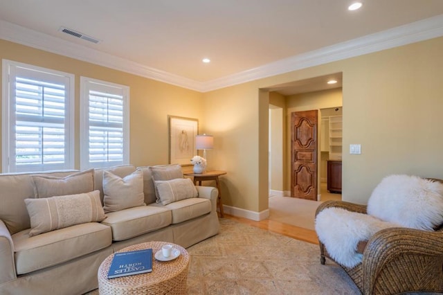 living room with crown molding