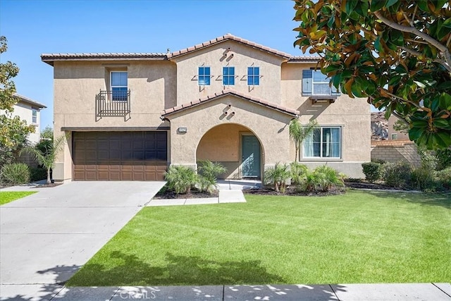 mediterranean / spanish-style home with a front lawn and a garage