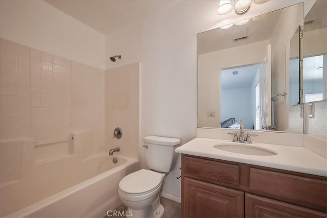 full bathroom with vanity, shower / bathtub combination, and toilet