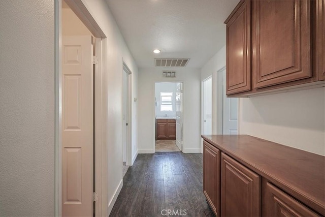 hall featuring dark hardwood / wood-style flooring