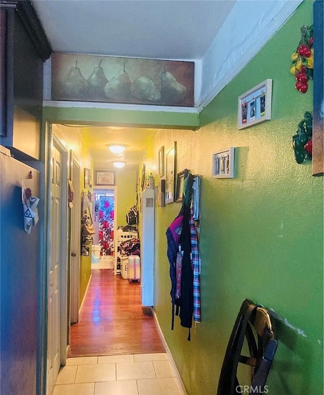 corridor featuring light hardwood / wood-style floors