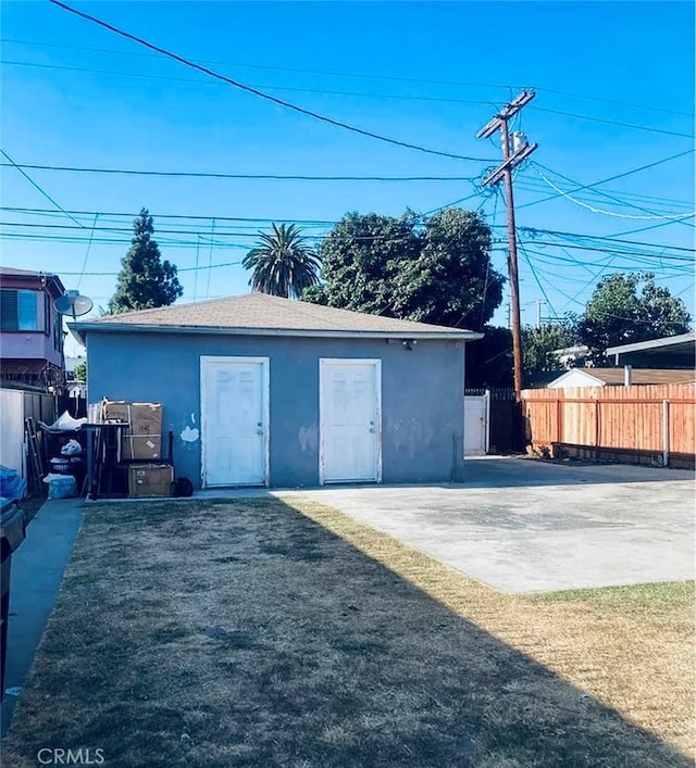 garage with a lawn