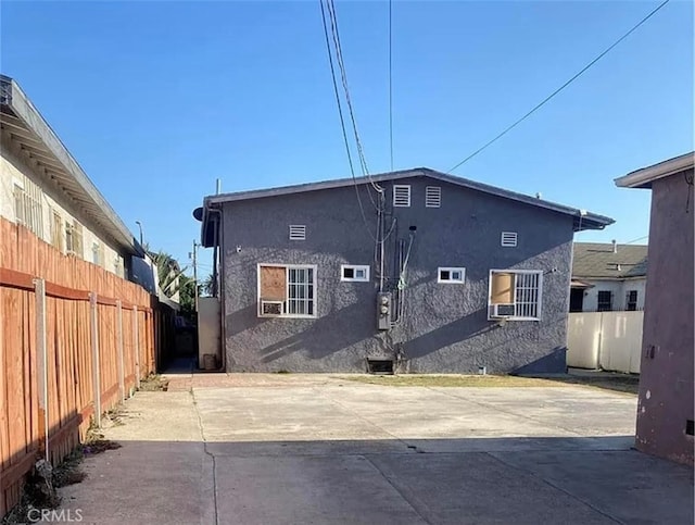 rear view of house with a patio