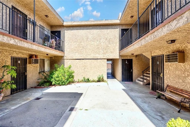 view of property's community featuring a patio area