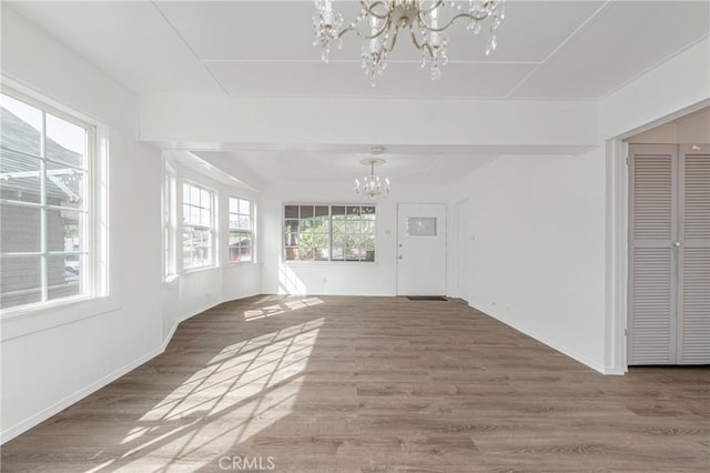 interior space featuring a notable chandelier